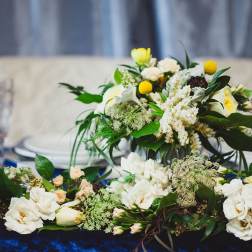 head table wedding floral arrangement, white and yellow flowers, by Vancouver Island florist petal and Kettle, Parksville, B.C.