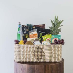 gourmet gift basket filled with food items assembled by Parksville gift basket maker Petal & Kettle