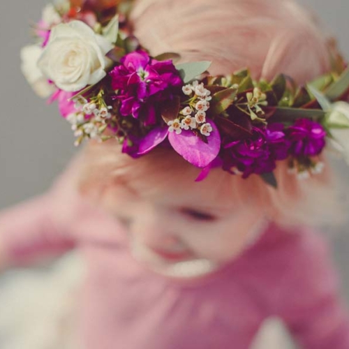 child wearing purple and white floral crown, by Parksville florist Petal and Kettle, Vancouver Island