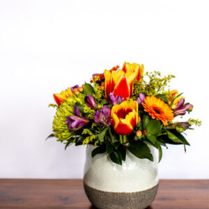 cheerful yellow and red flower vase arrangement from Qualicum Beach Parksville Nanaimo flower delivery service and florist Petal and Kettle