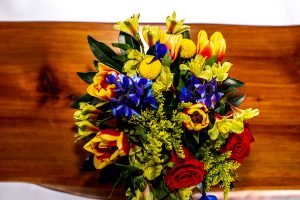 cheerful yellow and purple flower vase arrangement from Qualicum Beach Parksville Nanaimo floral delivery service and florist Petal and Kettle