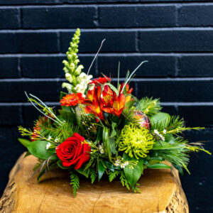 festive flower centerpiece made by Parksville florist Petal and Kettle