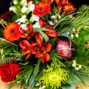 festive flower centerpiece made by Parksville florist Petal and Kettle