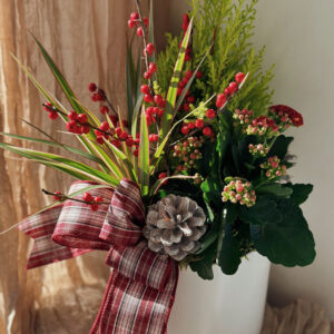 Festive Holiday Planter flowers, made by Parksville florist Petal and Kettle