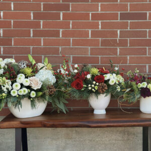 Three Holiday Vase arrangements, made and delivered by Parksville florist Petal and Kettle