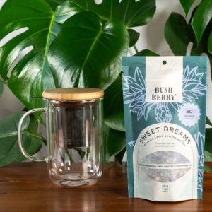 Bushberry tea, clear tea cup, and infuser sold at Parksville's Petal and Kettle