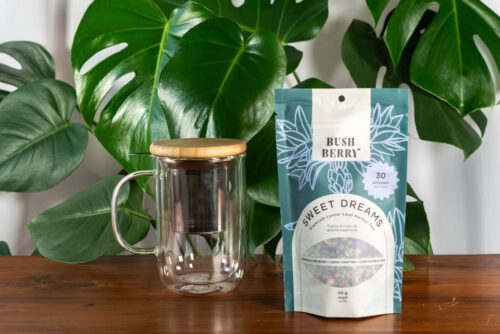 Bushberry tea, clear tea cup, and infuser sold at Parksville's Petal and Kettle